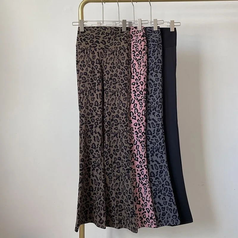 Leopard print yoga pants are breathable and make legs look longer. Slightly flared pants. High-waisted sports Pilates pants.