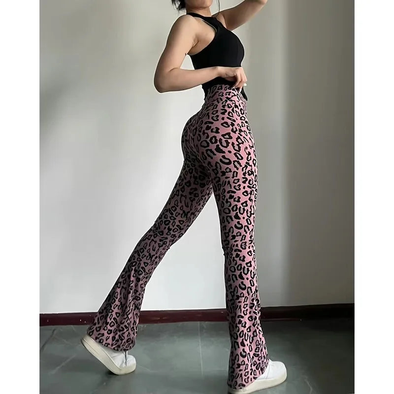 Leopard print yoga pants are breathable and make legs look longer. Slightly flared pants. High-waisted sports Pilates pants.