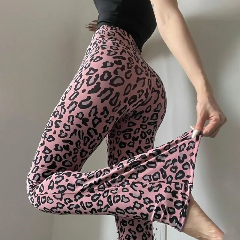 Leopard print yoga pants are breathable and make legs look longer. Slightly flared pants. High-waisted sports Pilates pants.